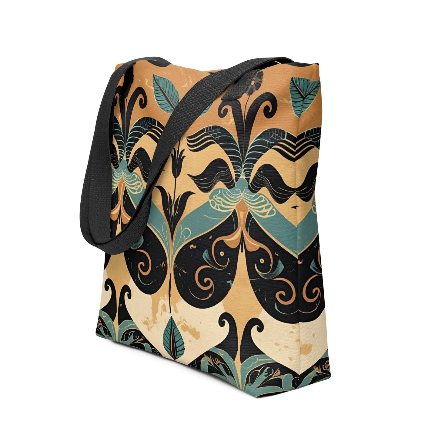 Minara Tote Bag - Crete-inspired Minara tote bag with Mediterranean-style symmetrical pattern in teal, gold, and black, photographed against a rustic stone wall.
