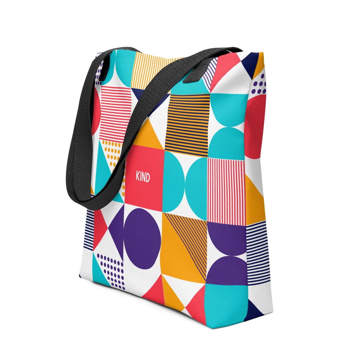 Optimism Tote Bag - A vibrant tote bag featuring a colorful, abstract pattern on its surface. With the word KIND in the centre.