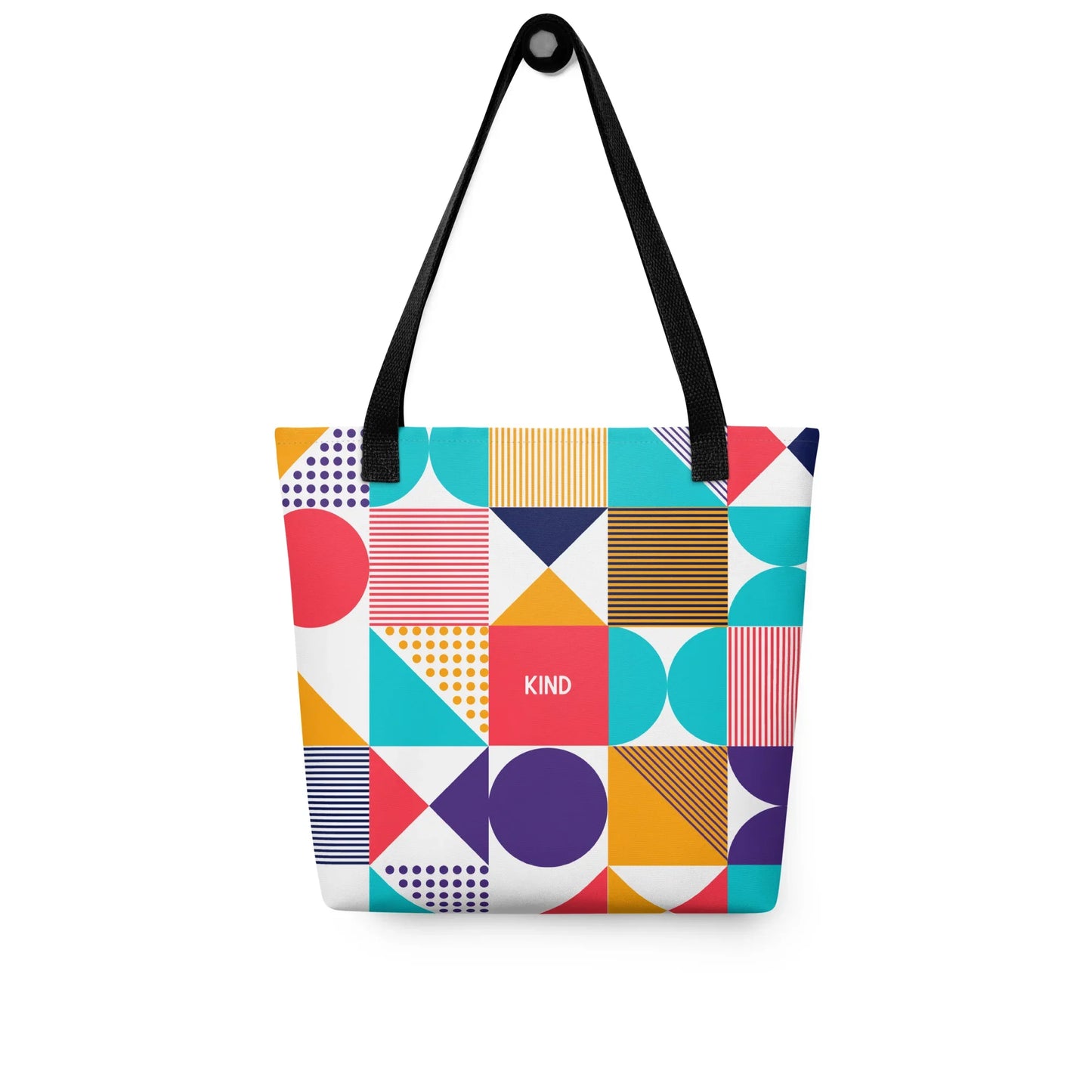 Optimism Tote Bag - A vibrant tote bag featuring a colorful, abstract pattern on its surface. With the word KIND in the centre.