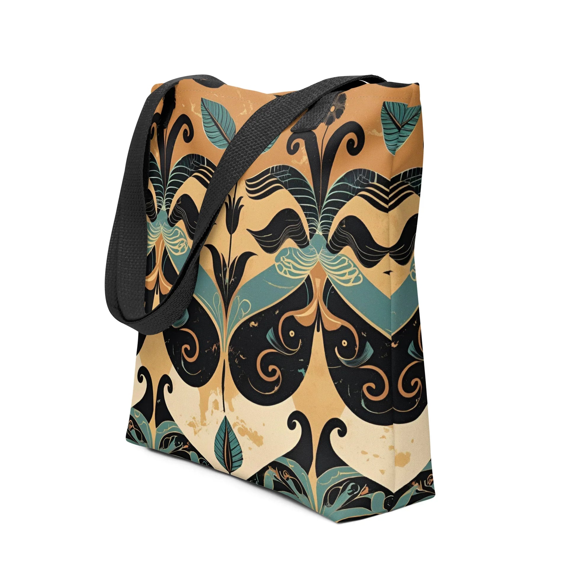 Minara Tote Bag - Crete-inspired Minara tote bag with Mediterranean-style symmetrical pattern in teal, gold, and black, photographed against a rustic stone wall.